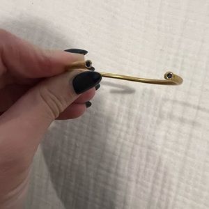 gold bangle with sapphie gem detail